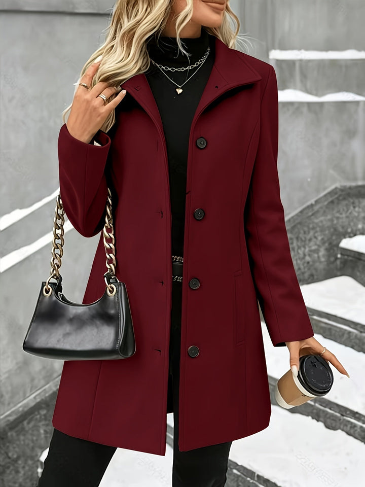 Chic tailored women's longline coat, single-breasted with a sophisticated notch collar for winter.