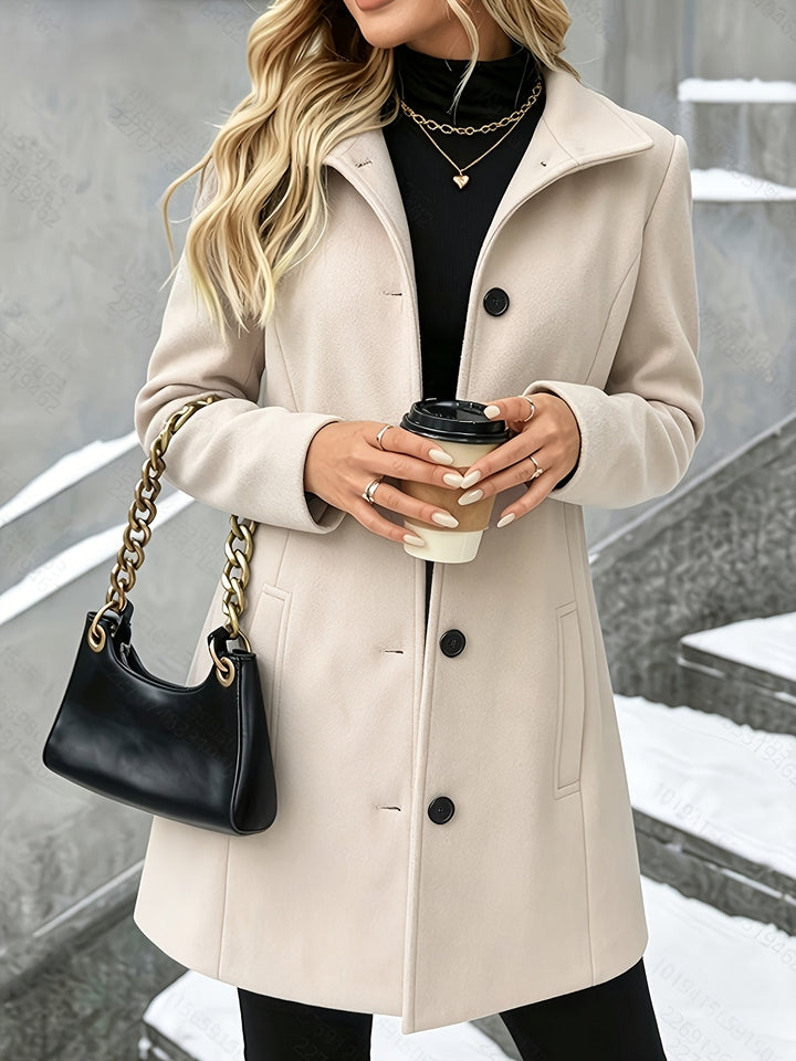 Sophisticated elegant women's longline coat, single-breasted style with a classic notch collar.