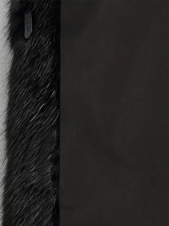 Warm women's longline hooded coat, an elegant and chic choice for sophisticated autumn-winter fashion.