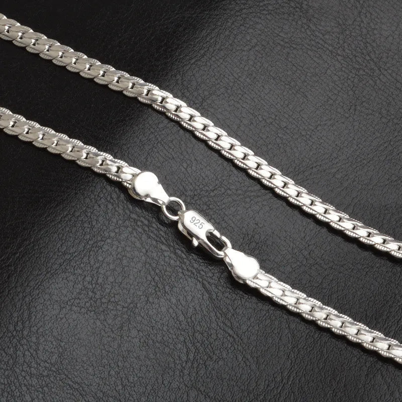 Women's elegant lucky charm pendant necklace on a model, showcasing its versatile fashion accessory appeal.