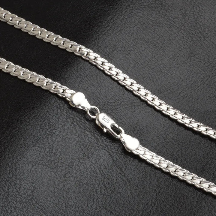 Women's elegant lucky charm pendant necklace on a model, showcasing its versatile fashion accessory appeal.