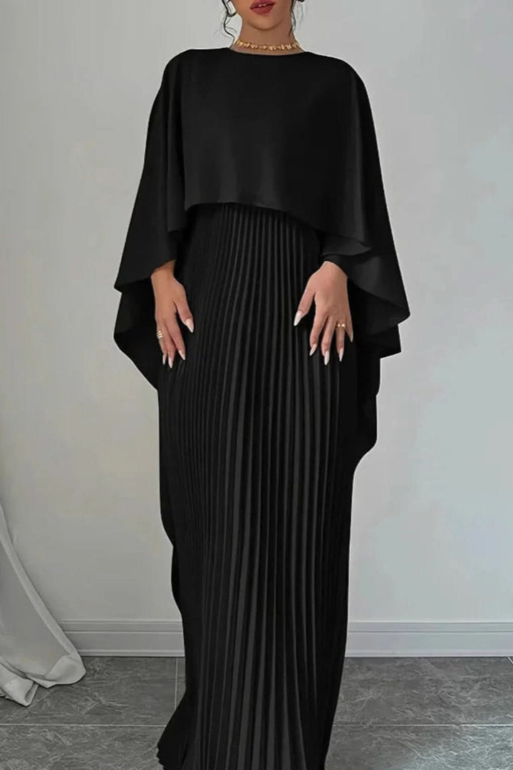Sophisticated women's pleated cape maxi dress. Elegant long evening gown for formal special occasions.