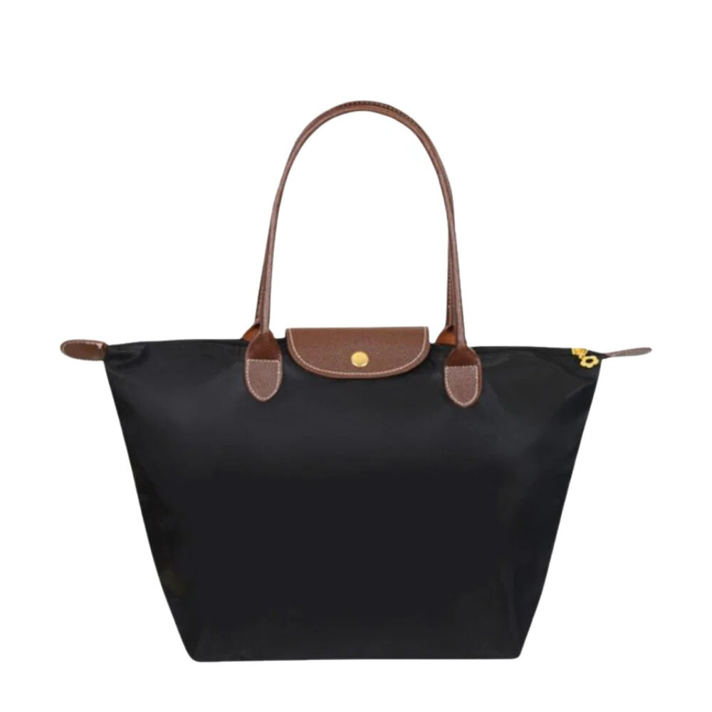 Elegant women's luxury handle bag, perfect for stylish daily use. Sophisticated top carry purse in classic design.