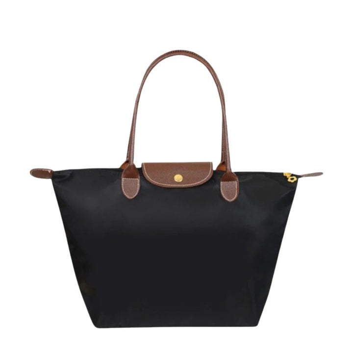 Elegant women's luxury handle bag, perfect for stylish daily use. Sophisticated top carry purse in classic design.