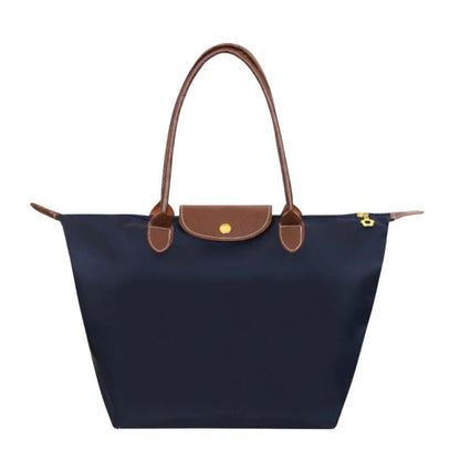 Chic women's luxury handle bag with a refined design. A timeless and elegant top carry purse for any occasion.