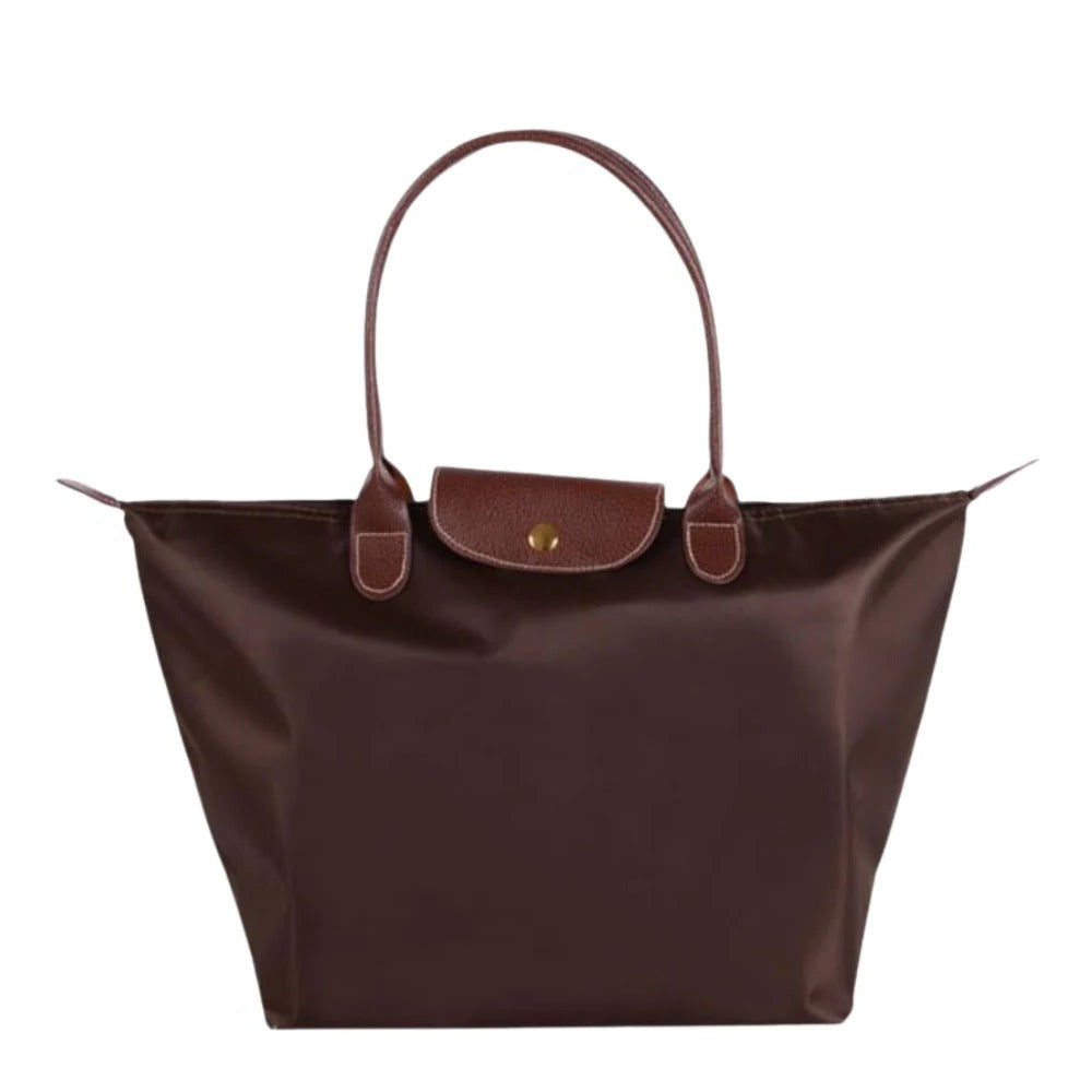 Luxury women's handle purse. Elegant top carry bag, a stylish and versatile fashion accessory for women.