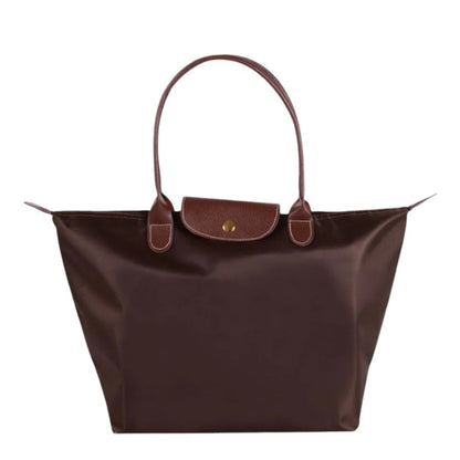 Luxury women's handle purse. Elegant top carry bag, a stylish and versatile fashion accessory for women.