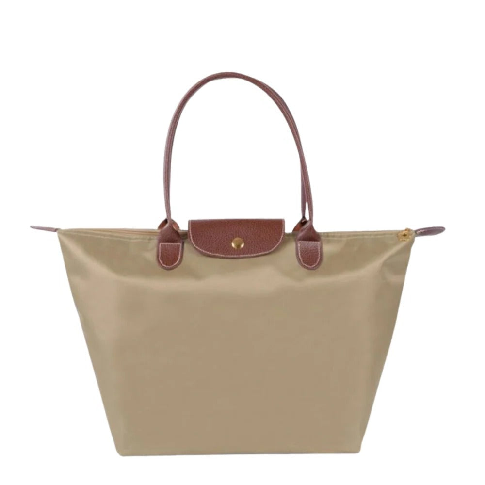Versatile women's luxury handle bag. An elegant top carry purse, ideal as a stylish everyday fashion accessory.