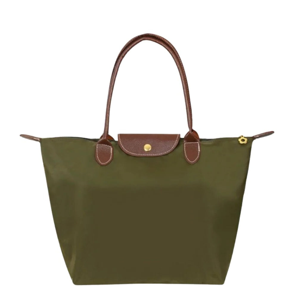 Premium women's luxury handle bag. Elegant top carry purse, a must-have stylish fashion accessory.