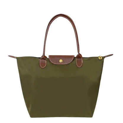 Premium women's luxury handle bag. Elegant top carry purse, a must-have stylish fashion accessory.