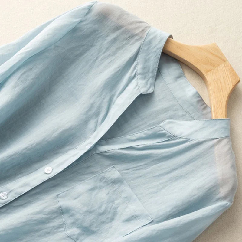 Stylish women's mandarin collar blouse, perfect for everyday casual wear. A versatile top for spring fashion.