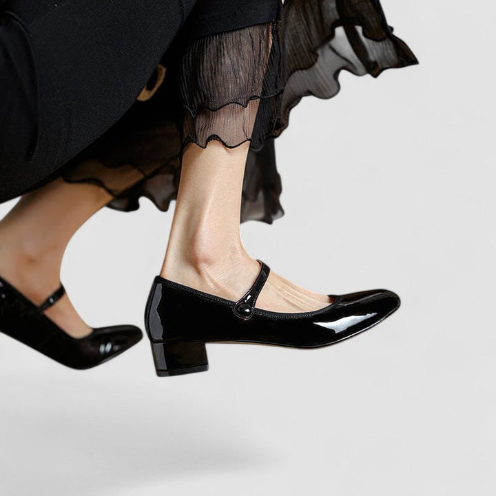 Comfortable women's Mary Jane strap shoes with a classic round toe and elegant block heel.