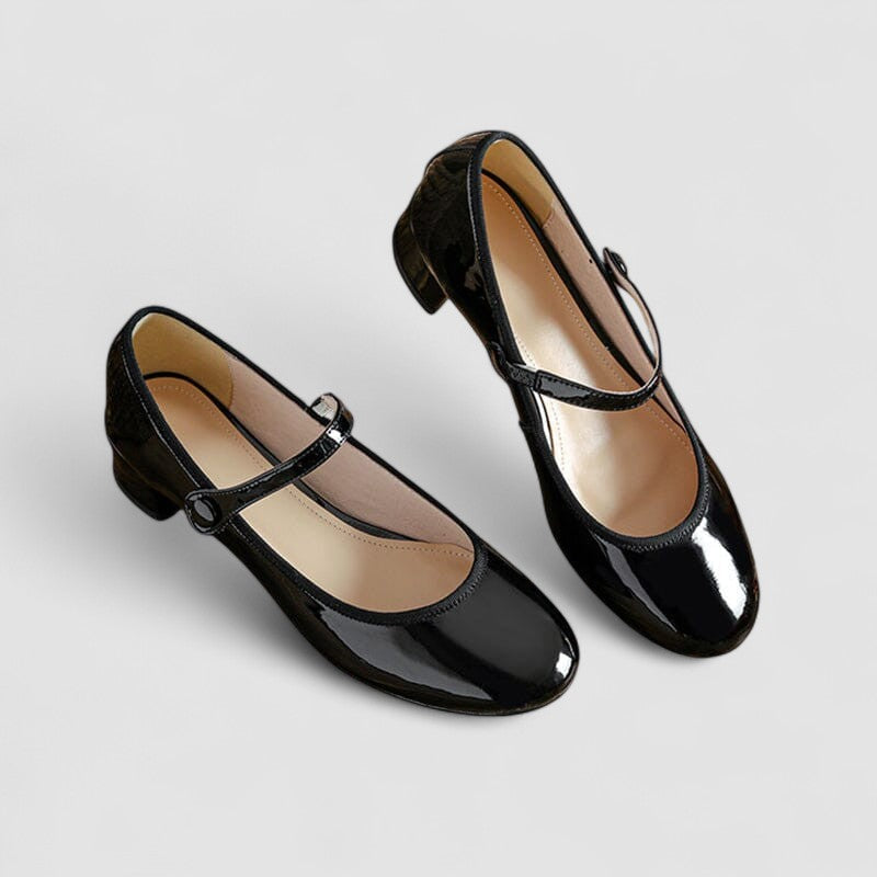 Classic women's Mary Jane block heel shoes, featuring a comfortable round toe, suitable for elegant attire.
