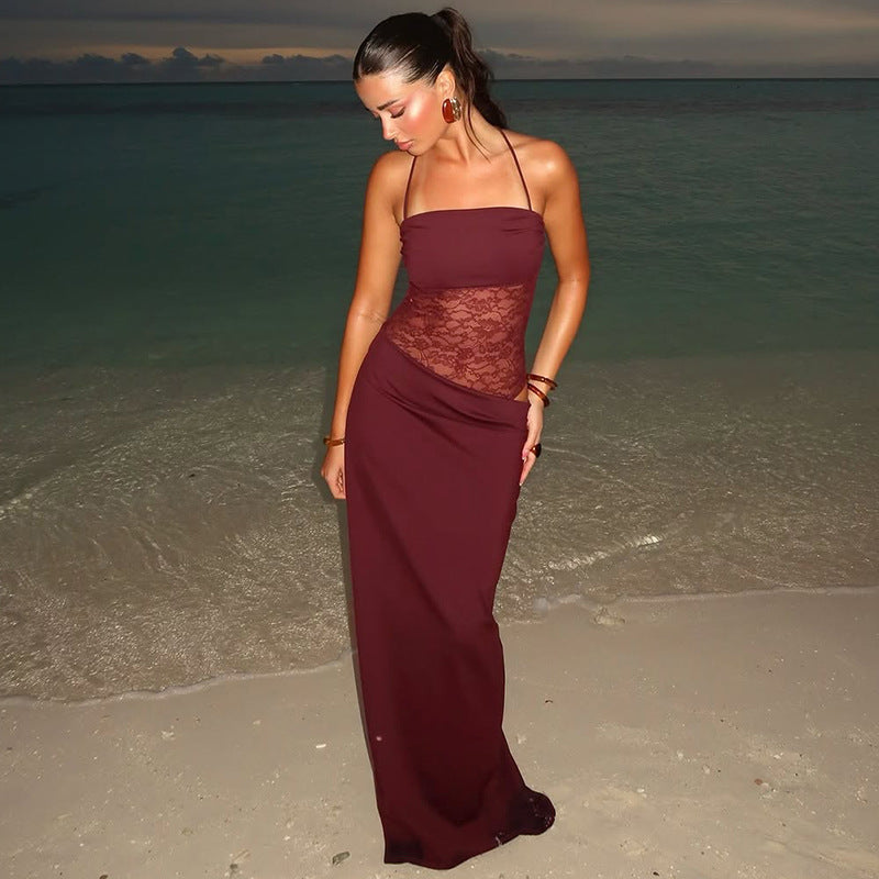 Women's elegant strappy maxi dress with intricate lace detailing, perfect for formal and special occasions.