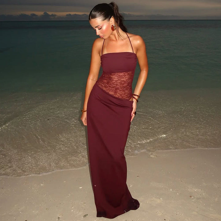 Women's elegant strappy maxi dress with intricate lace detailing, perfect for formal and special occasions.