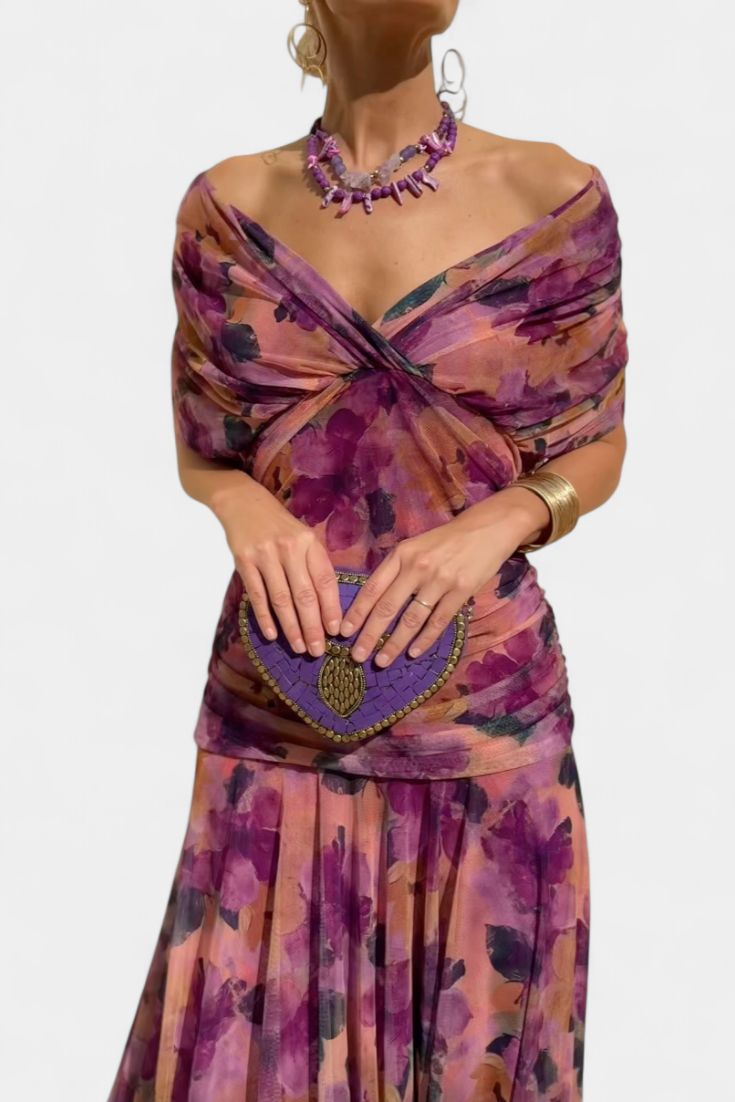 Formal women's evening gown, elegant v-neck & pleated waist design for sophisticated style.