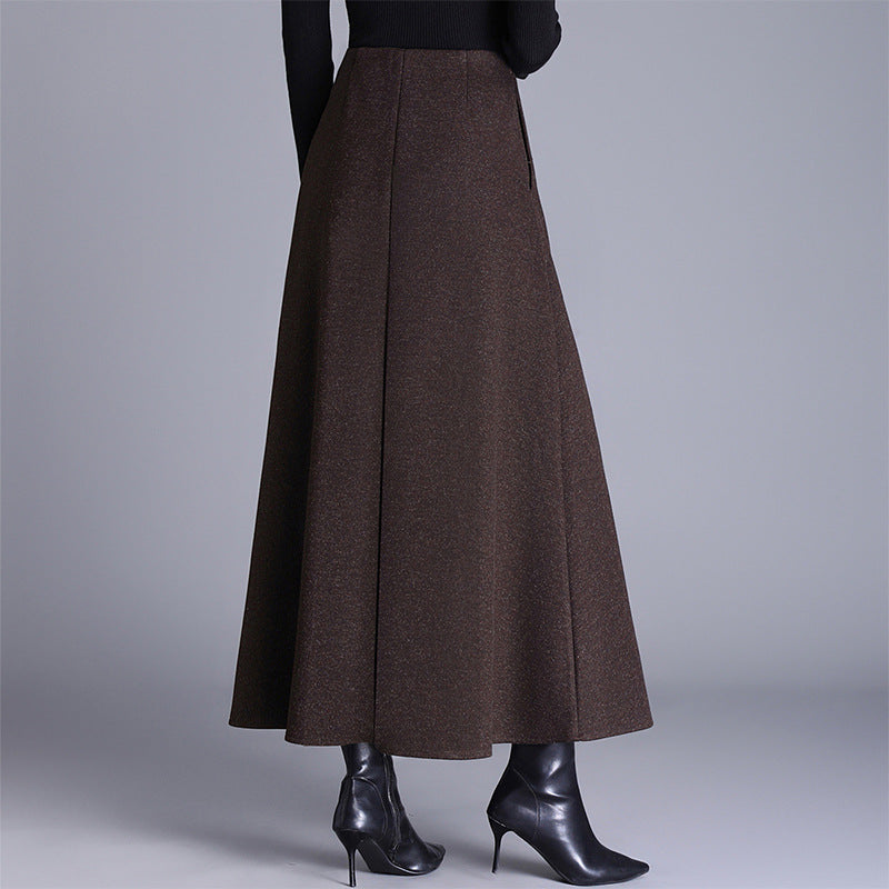 Comfortable women's flowing maxi skirt for elegant fall and winter fashion. Versatile for office or casual chic wear.