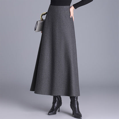 Chic women's elegant maxi skirt. Versatile long skirt for sophisticated office wear or comfortable casual fall fashion.