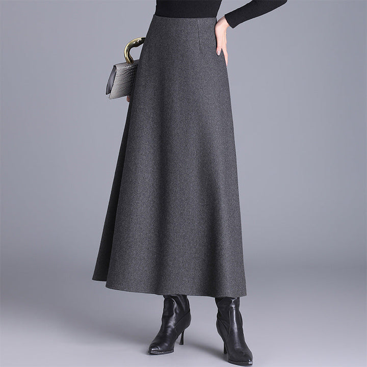 Chic women's elegant maxi skirt. Versatile long skirt for sophisticated office wear or comfortable casual fall fashion.