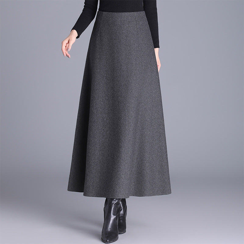 Flowing women's elegant maxi skirt in a comfortable long design. Ideal for fall & winter, suitable for office or casual.