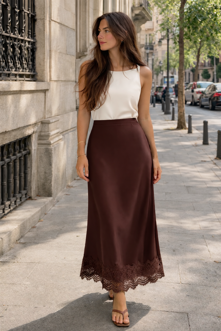 Women's formal evening maxi skirt with elegant lace trim, suitable for special occasions.
