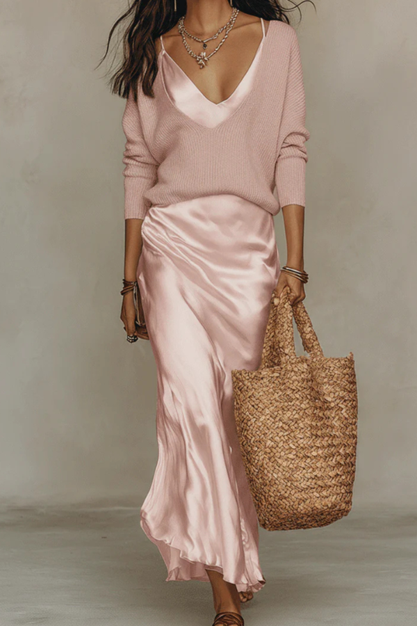 Stylish women's midi dress and cozy sweater set, offering comfortable elegance for any occasion.