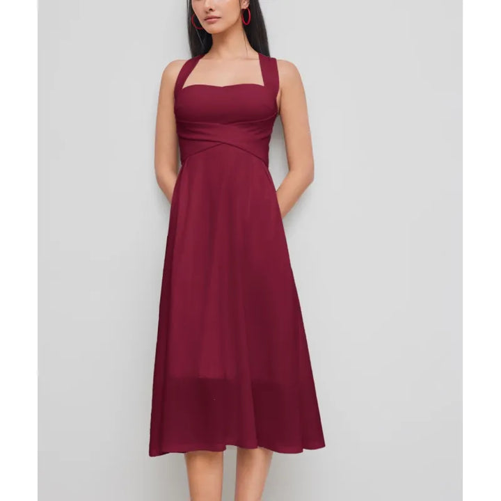 Sleeveless square neck midi dress for women, featuring an elegant cross-waist detail. Flattering & chic fashion.