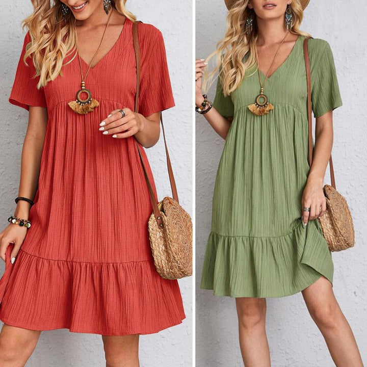 Elegant women's midi dress with a flattering fit, perfect for special occasions.