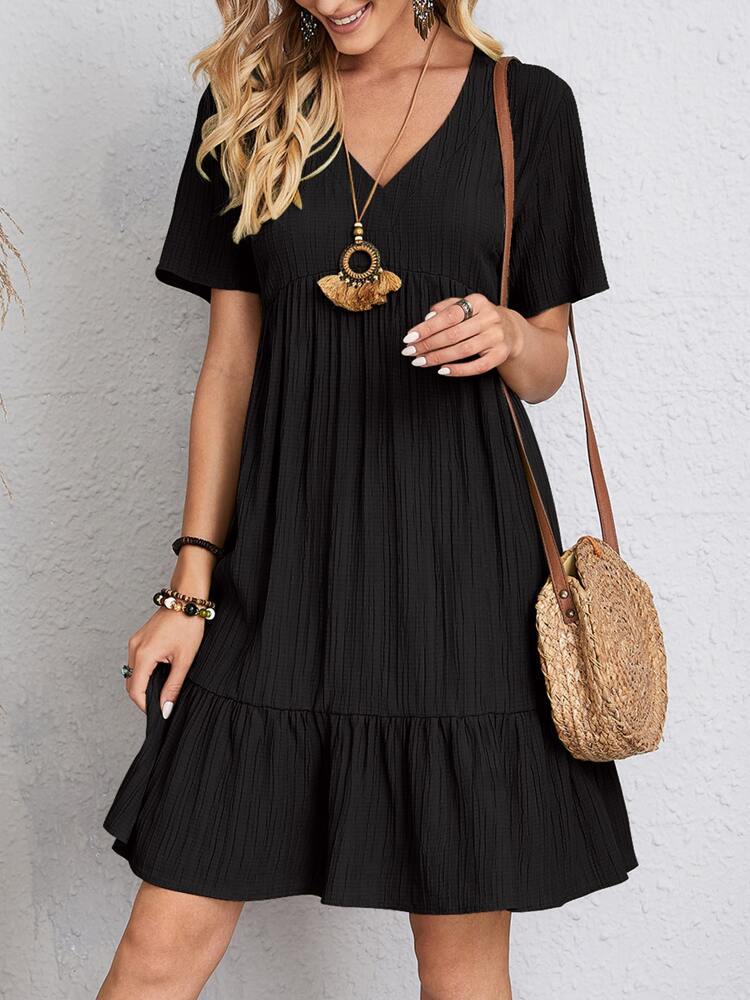 Elegant women's layered midi dress, offering a flattering fit & comfortable style.