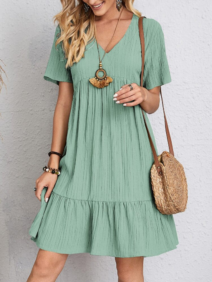 Chic women's midi dress for special occasions, elegant with flattering belly coverage.