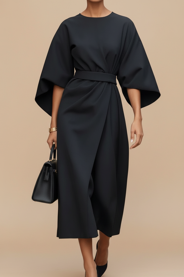 Versatile women's elegant midi dress, featuring beautiful lantern sleeves, perfect for various occasions.