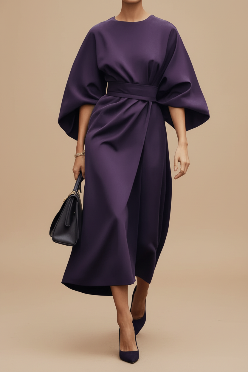 Flattering women's occasion midi dress with elegant lantern sleeves. A perfect choice for a sophisticated look.