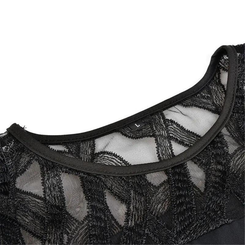 Stylish women's midi dress with delicate lace sleeves, a round neck, and an elegant silhouette.