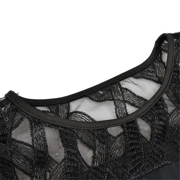 Stylish women's midi dress with delicate lace sleeves, a round neck, and an elegant silhouette.