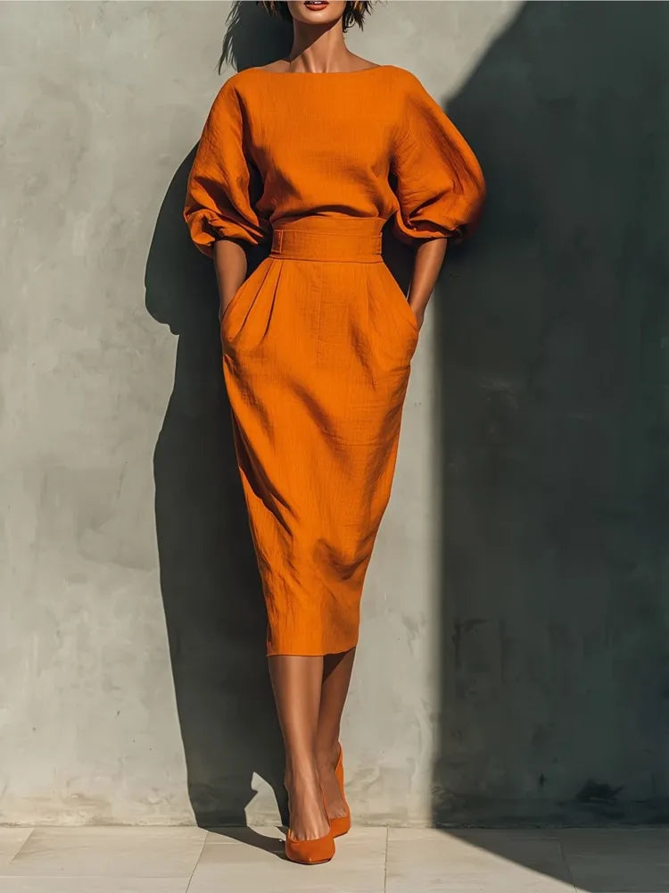 Elegant women's midi dress with pleated details & chic lantern sleeves, perfect for office or special occasions.