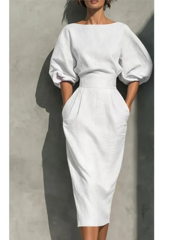 Stylish women's pleated midi dress with graceful lantern sleeves & flattering cinched waist, ideal for events.