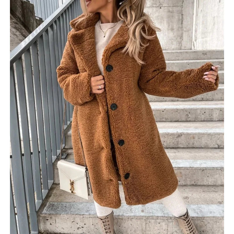 Elegant women's Milano longline winter coat. Stay warm and stylish in this cozy, modern outerwear for fall/winter.