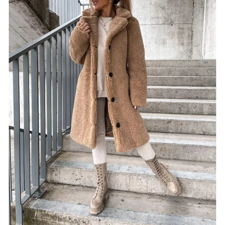 Warm women's Milano longline coat. Elegant and cozy winter outerwear, a stylish statement piece for fall and winter fashion.