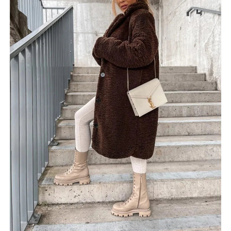 Milano longline women's winter coat. This elegant, warm, and stylish outerwear is a must-have for fall/winter fashion.