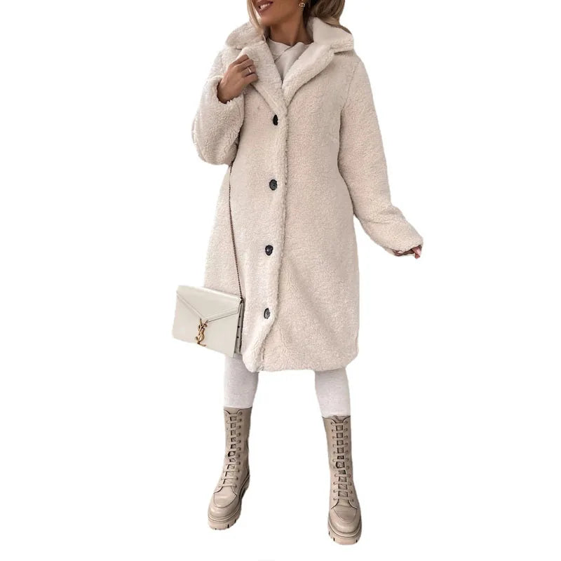 Cozy women's Milano longline winter coat. Elegant and warm outerwear, ideal for modern fall/winter fashion & layered looks.