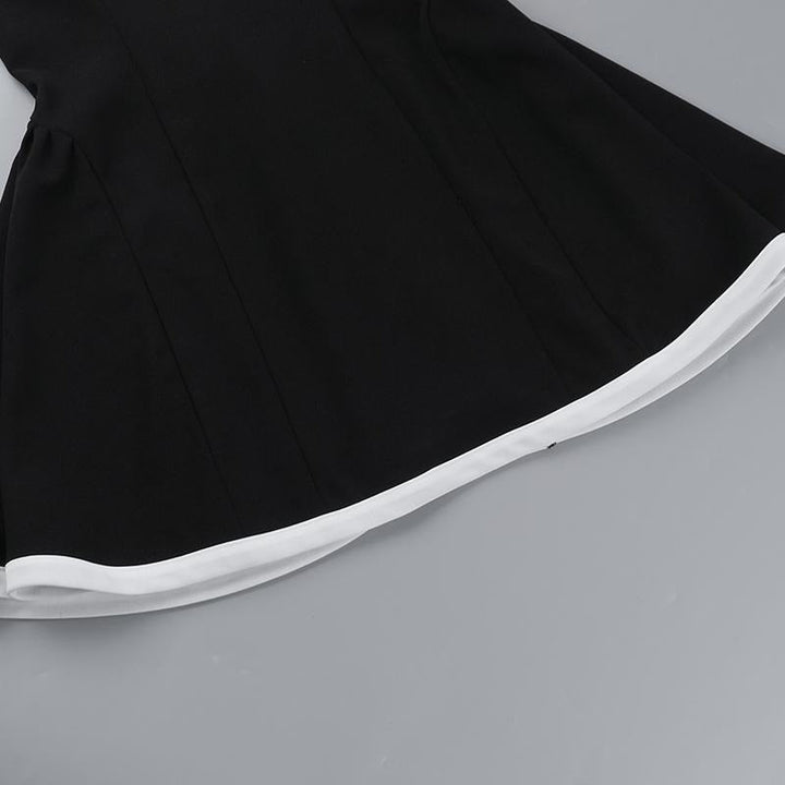 Women's elegant mini dress showcasing a sophisticated contrast neckline, a chic and flattering design.