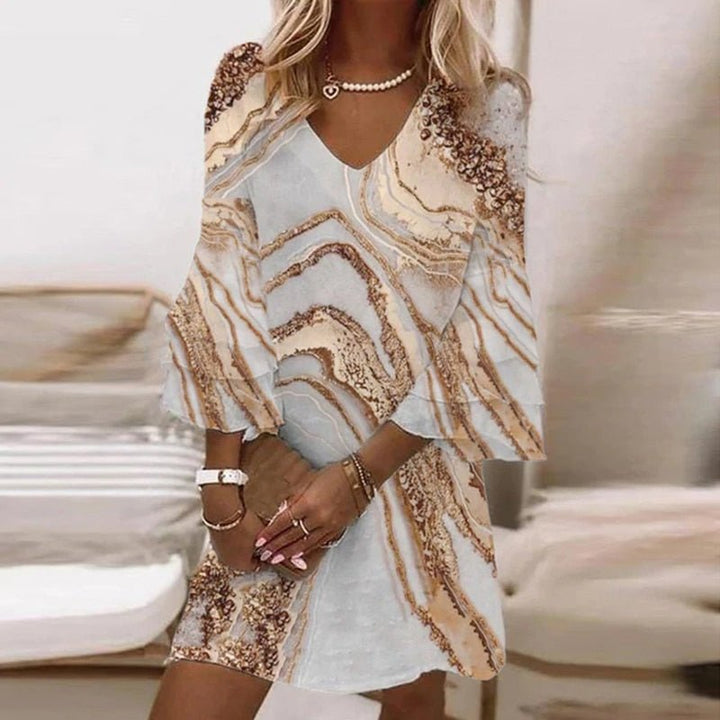 Elegant women's mini dress with marble swirl print, V-neck, and chic flare sleeves. Perfect for parties.