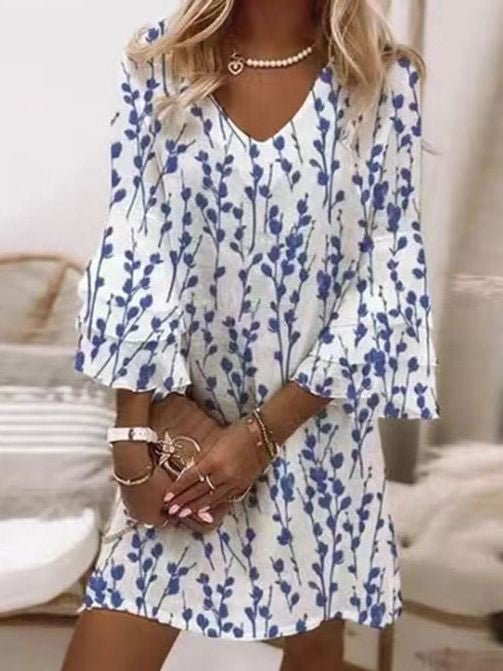 Elegant women's marble swirl flare sleeve mini dress. V-neck, perfect for casual wear or a party event.