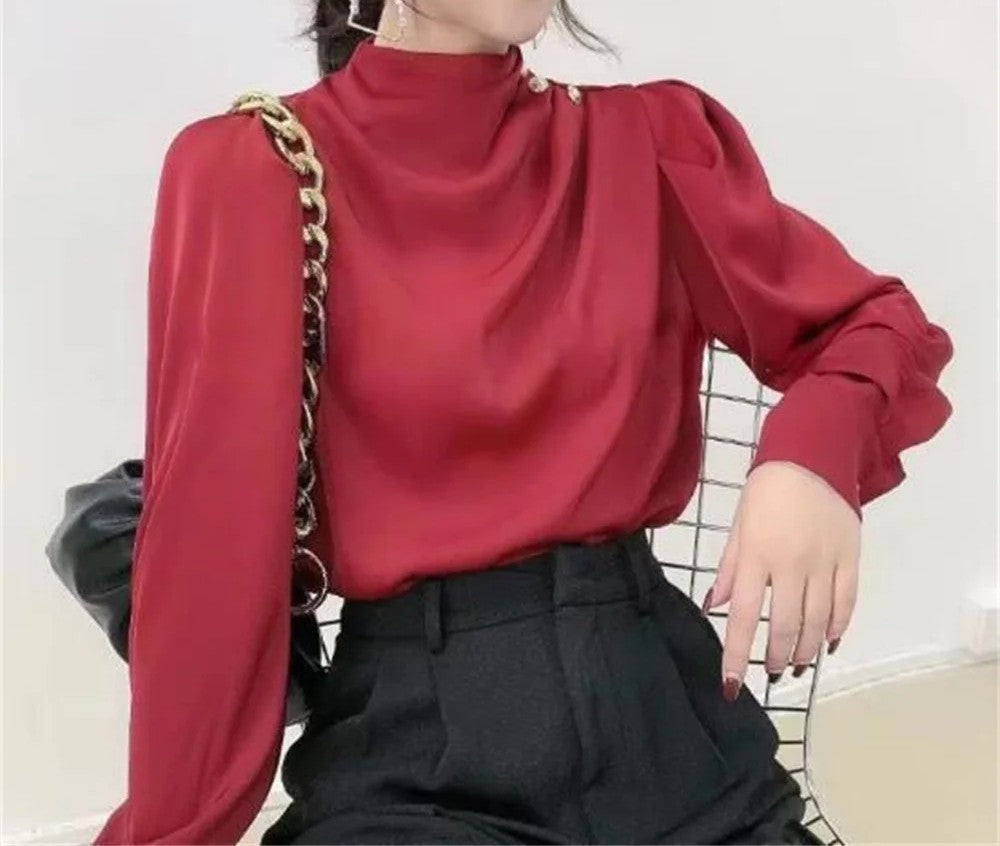 Chic women's mock neck ruched long sleeve blouse with eye-catching gold buttons. Stylish for office or evening.