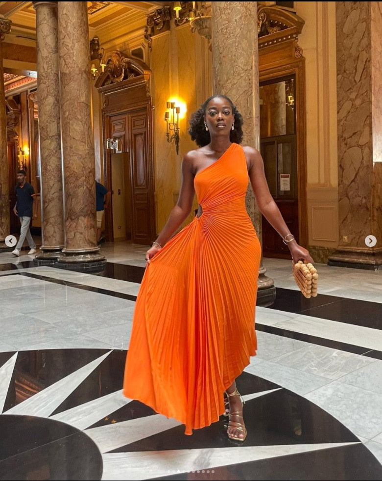 Beautiful pleated one-shoulder maxi dress for women, an elegant choice for evening wear and formal events.