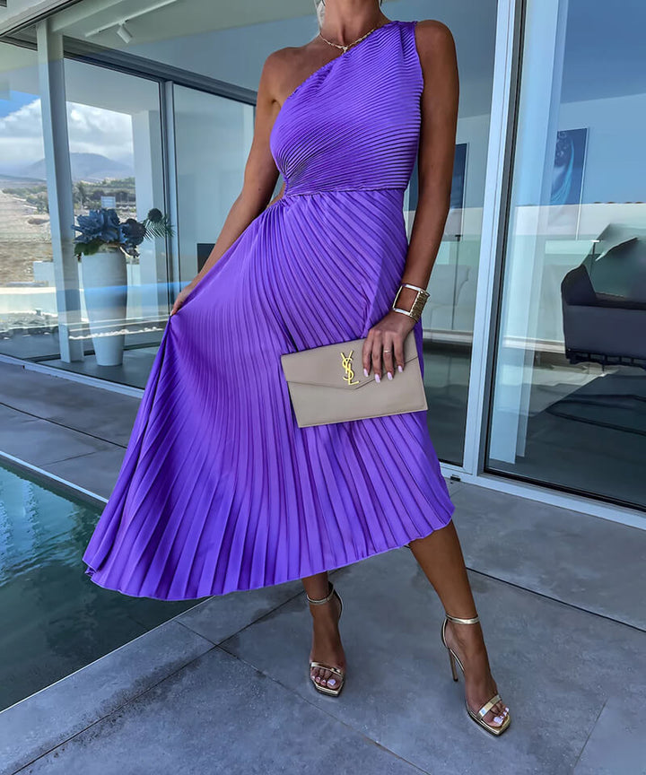 Beautiful one-shoulder pleated formal dress, a sophisticated choice for a wedding guest or cocktail party.