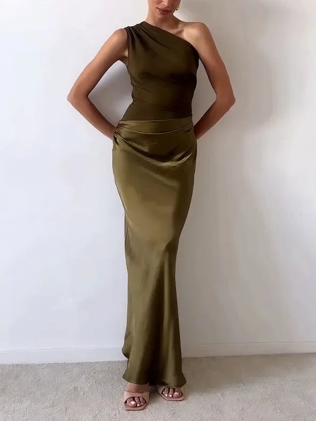 Stylish women's one-shoulder pleated maxi dress. Elegant formal wear for special occasions & parties.
