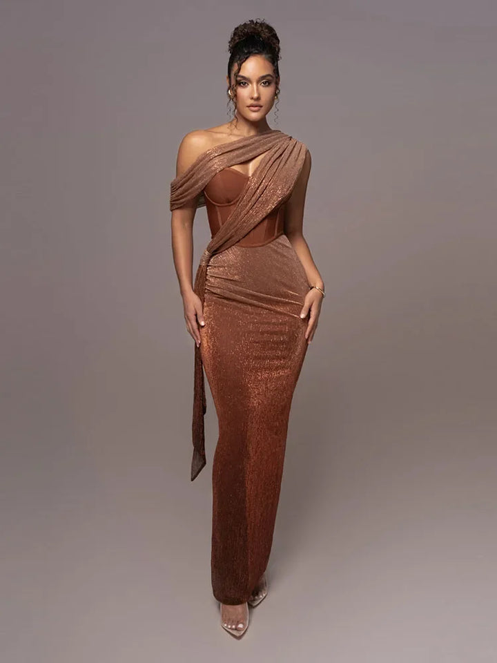 Elegant women's one-shoulder statement maxi dress for special occasions. Perfect formal evening wear with a sculpted fit.
