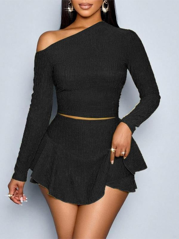 Elegant women's one-shoulder two-piece set, perfect for parties and club wear. Features a bodycon top & mini skirt.