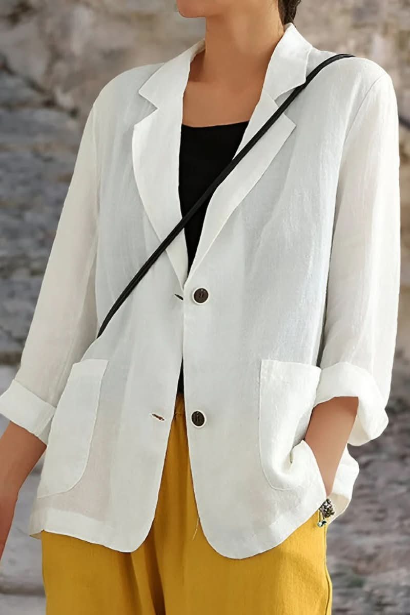 Elegant women's open back blazer in a tailored modern style, perfect for chic business attire or evening wear.